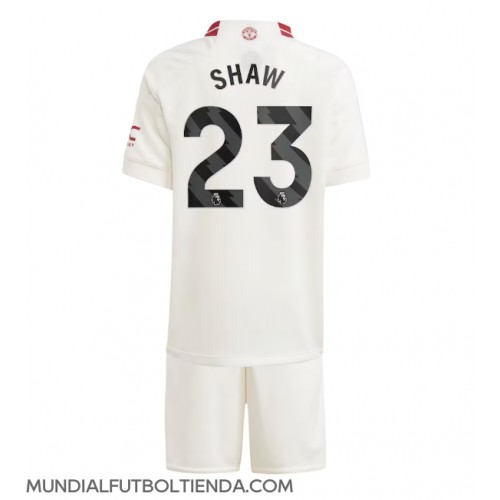 Camiseta Manchester United Luke Shaw #23 Tercera Equipación Replica 2023-24 para niños mangas cortas (+ Pantalones cortos)